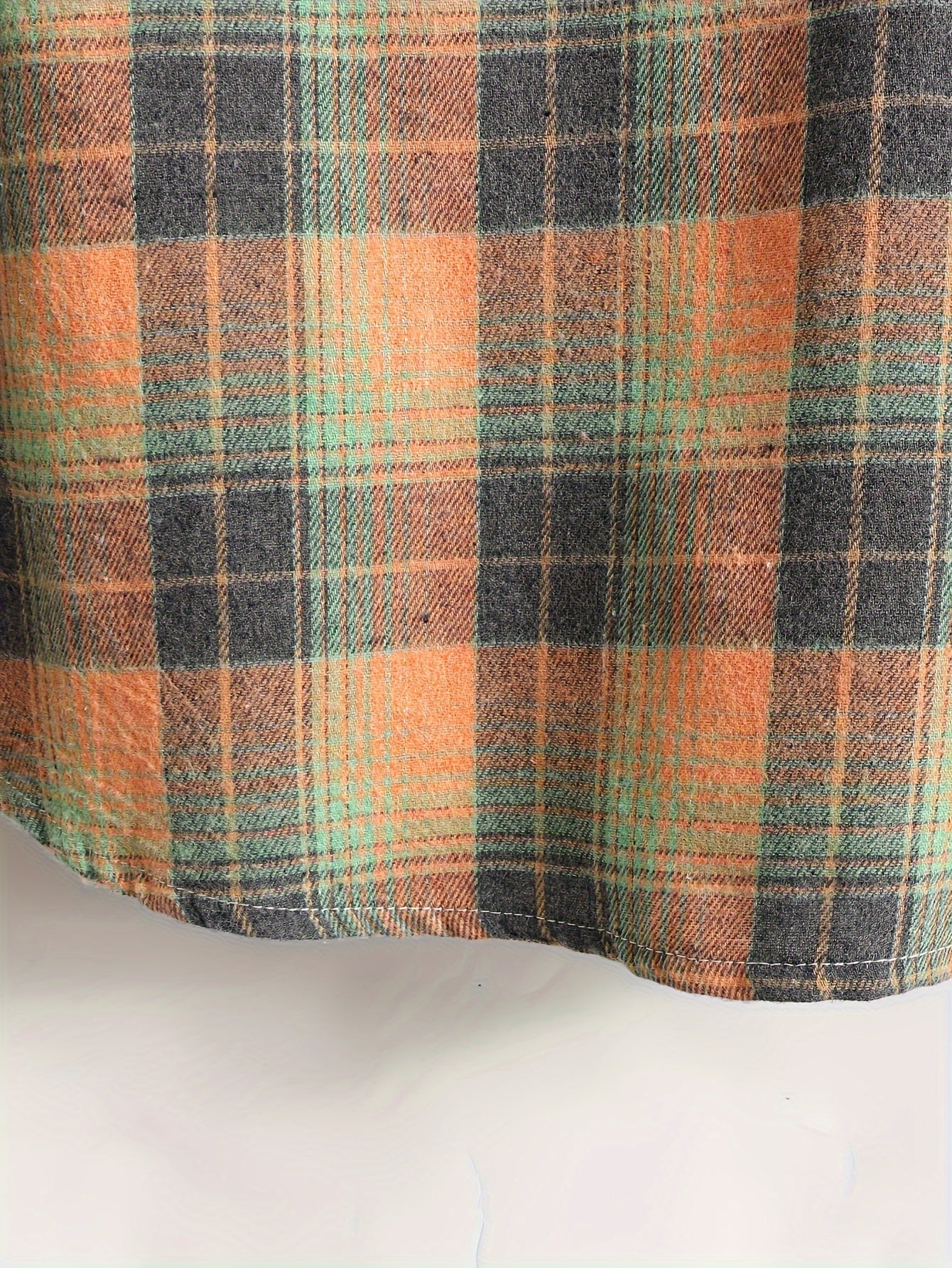Men's orange and green plaid long-sleeve casual shirt with button placket