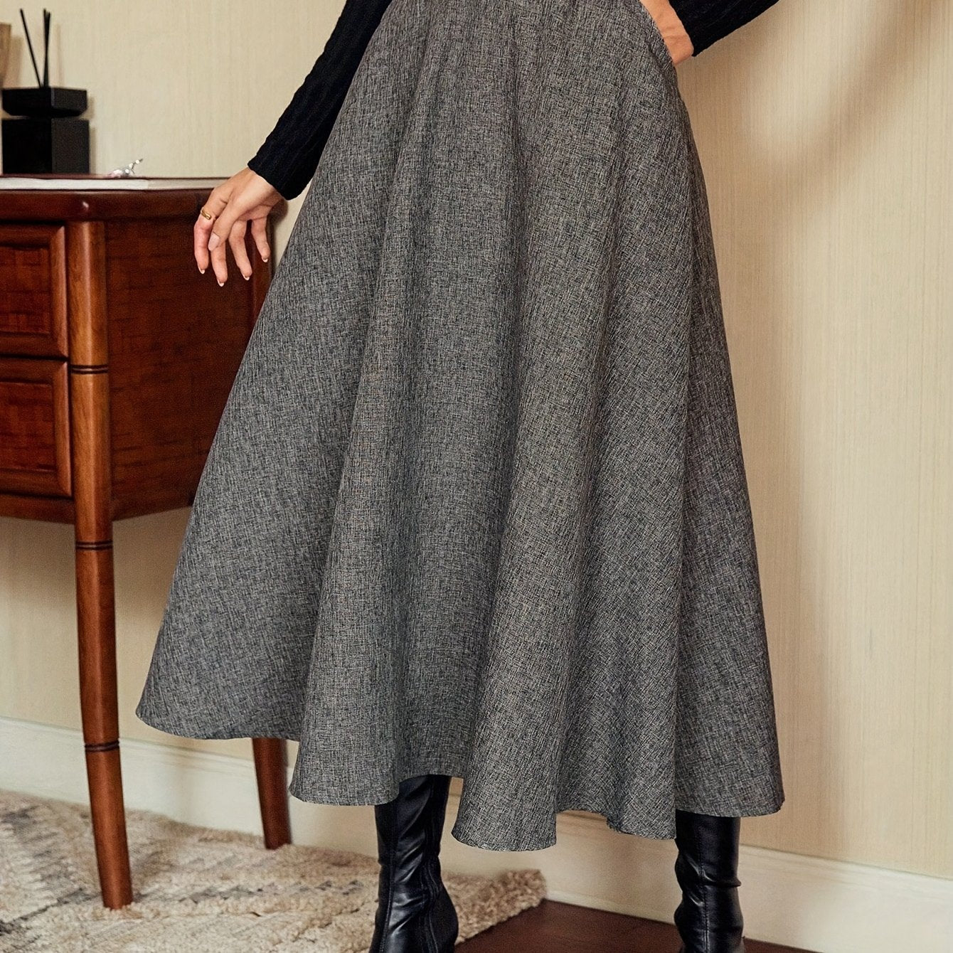Women's gray A-line midi skirt with a flared hem