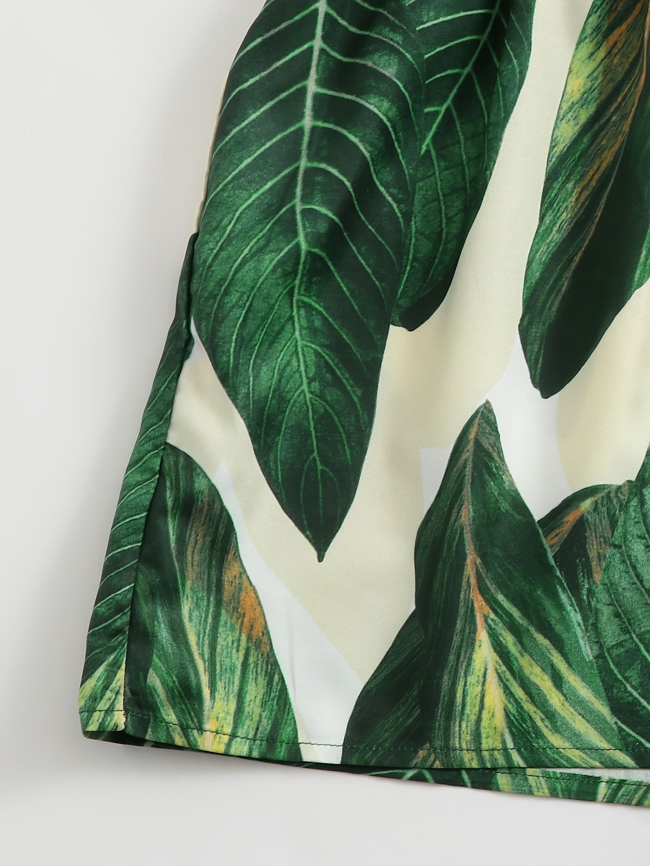 Women's jumpsuit with tropical leaf print – summery one-piece for vacation & leisure