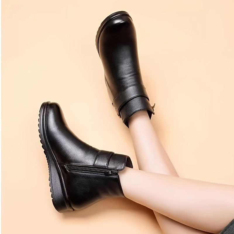 Women’s black winter ankle boots with warm lining and buckle