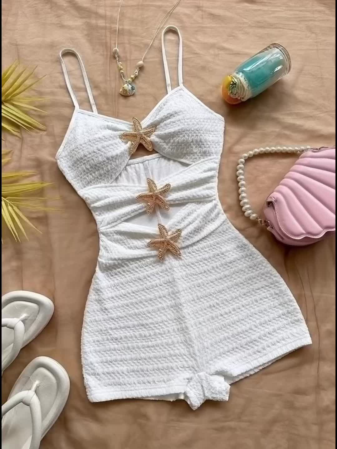 Women's beach jumpsuit with star appliqués and cut-outs – summery one-piece for vacation & pool parties