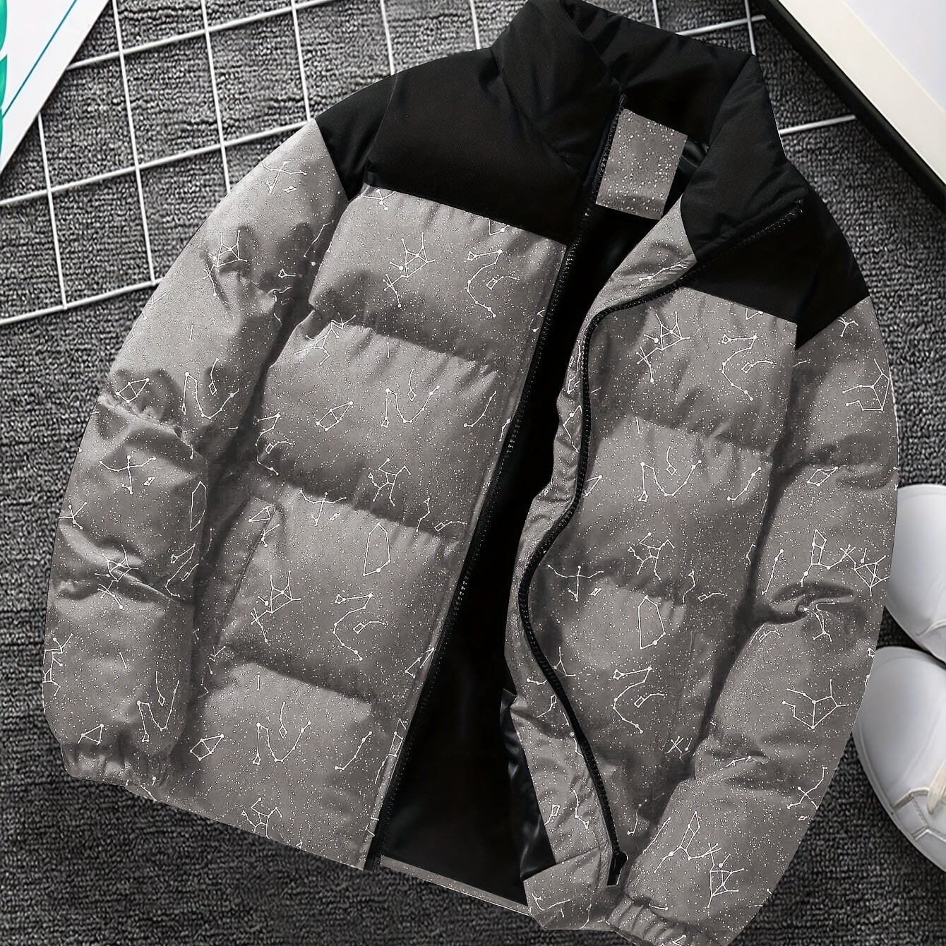 Padded jacket with constellation print, zipper, and stand-up collar