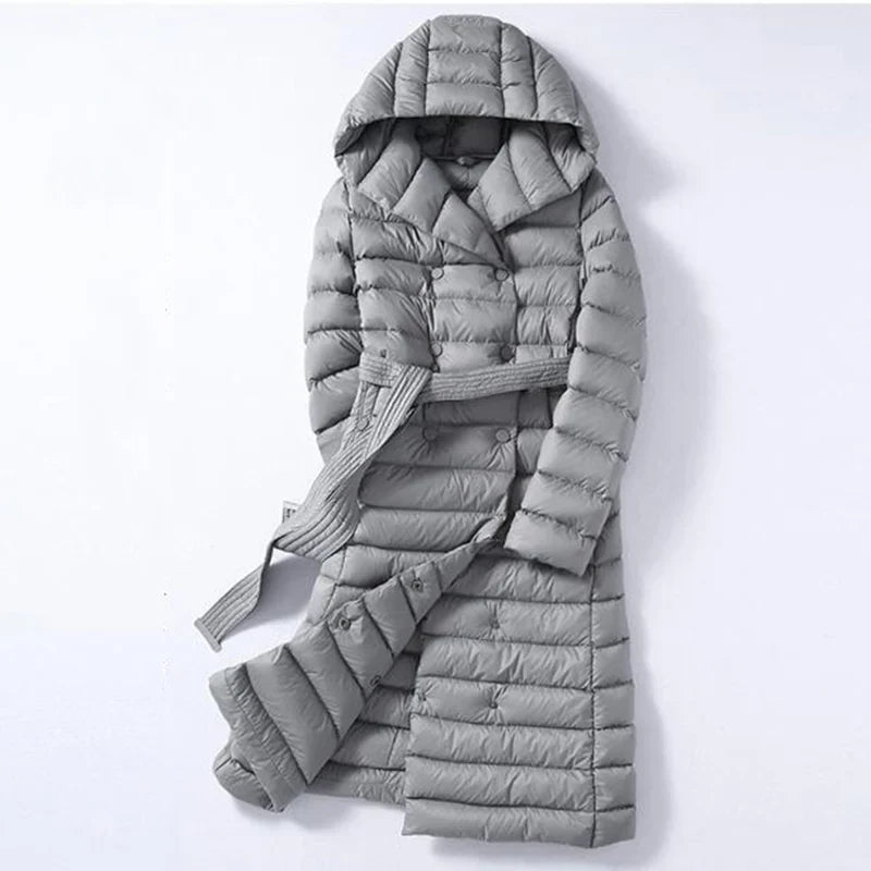 Women's long quilted coat with hood, double-breasted front, and belt