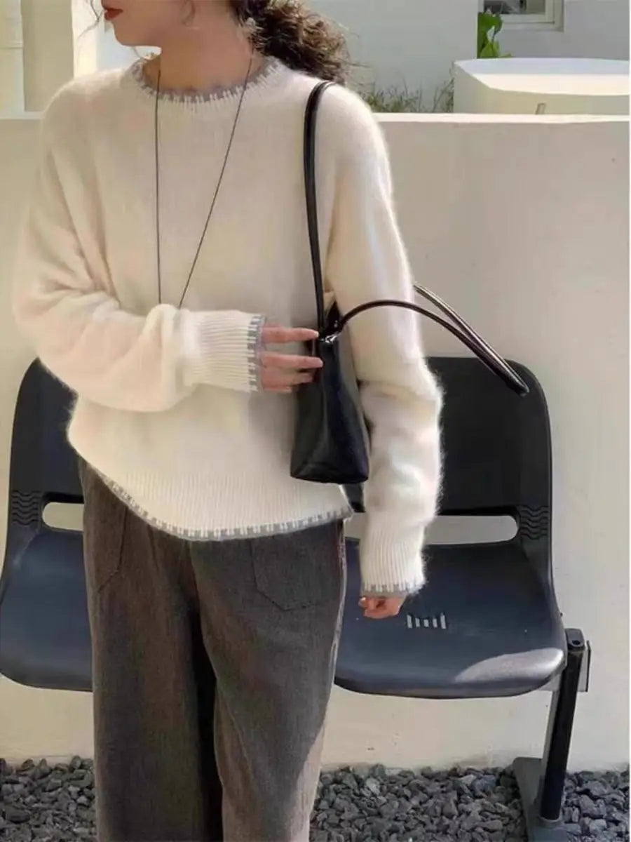 Women's crew-neck long-sleeve gray knit sweater with decorative trim