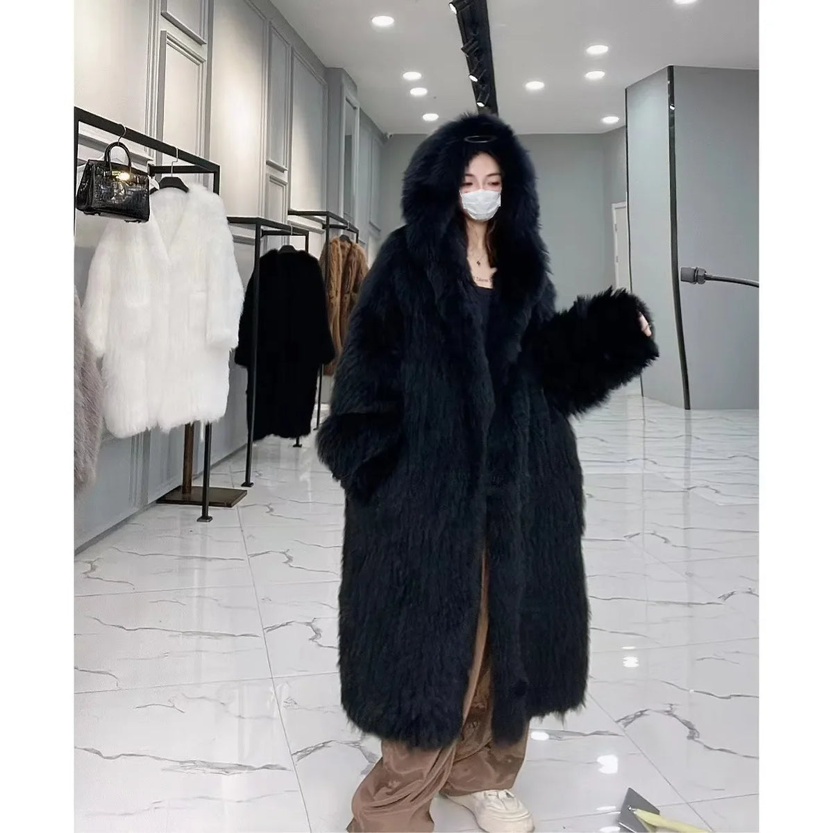 Long hooded coat with faux fur look