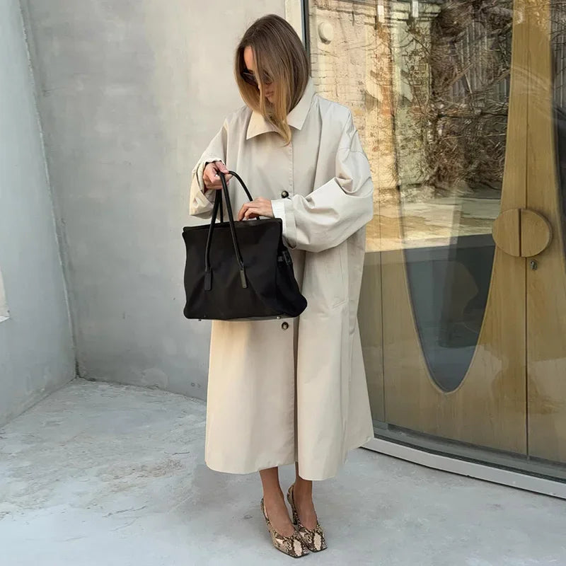 Women's oversized long coat with stand collar and button placket