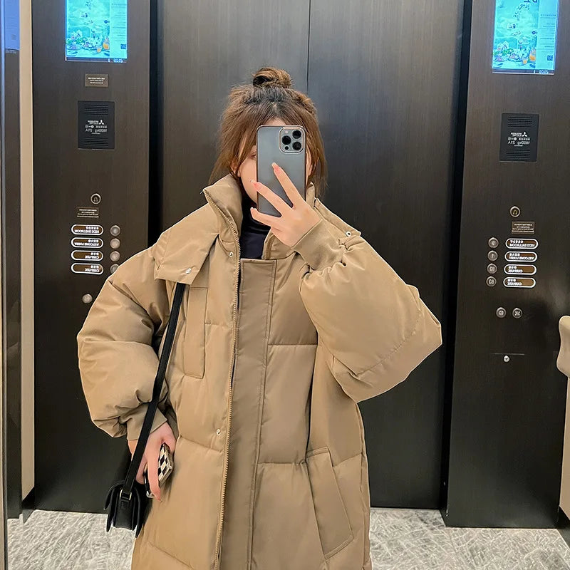 Long quilted coat for women with hood, padded, warm