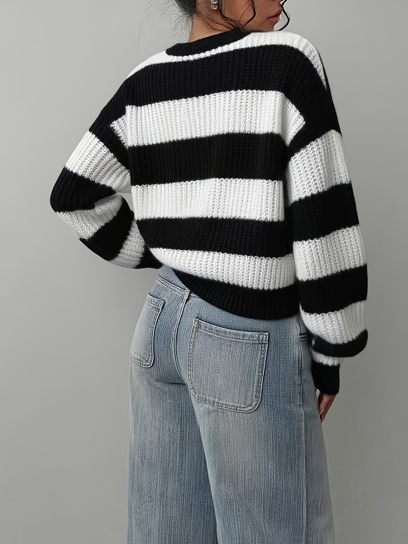 Women's knitted sweater, black and white striped, crew neck, loose fit