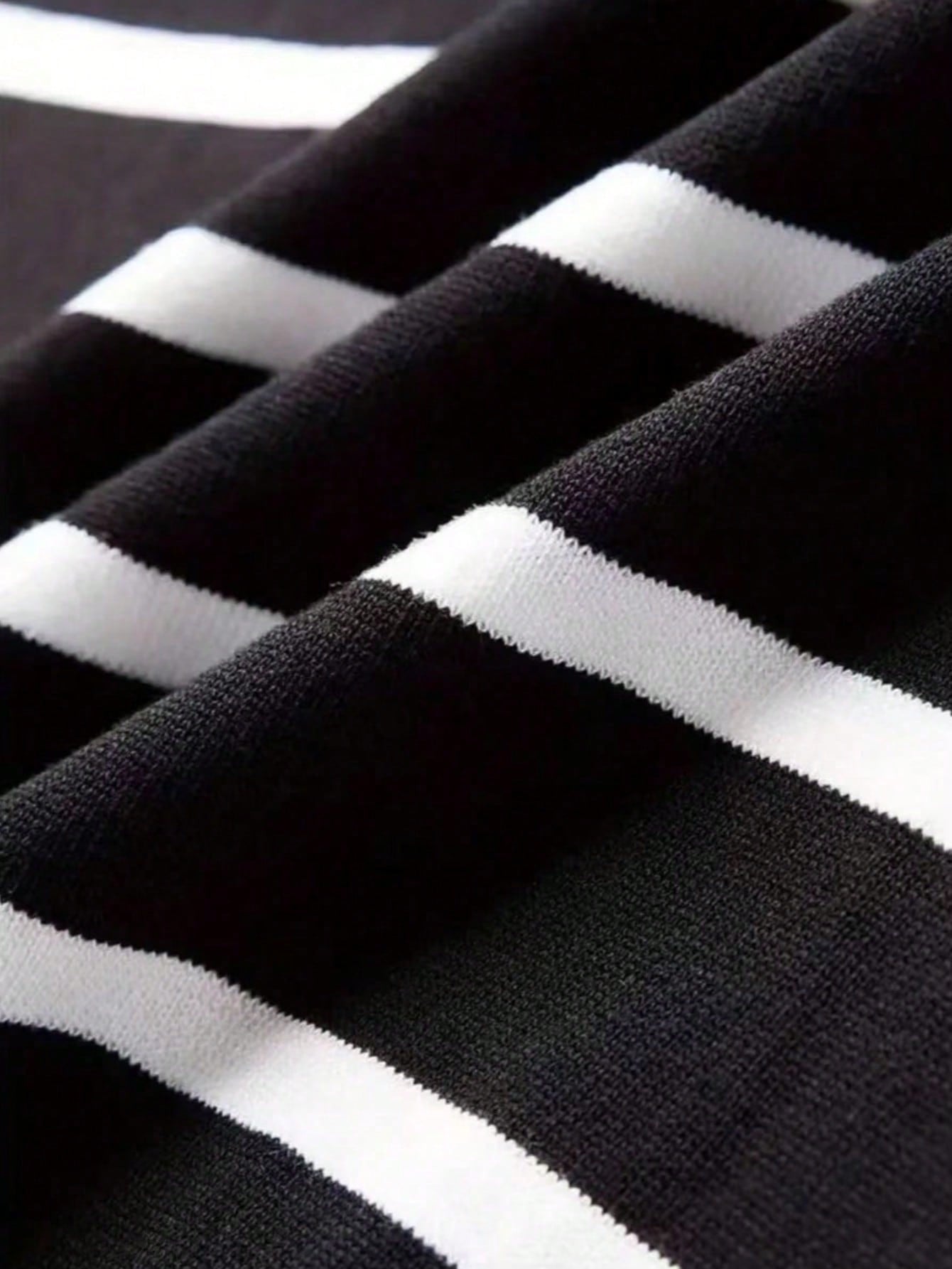 Striped men's crew-neck sweater, black and white, long-sleeved