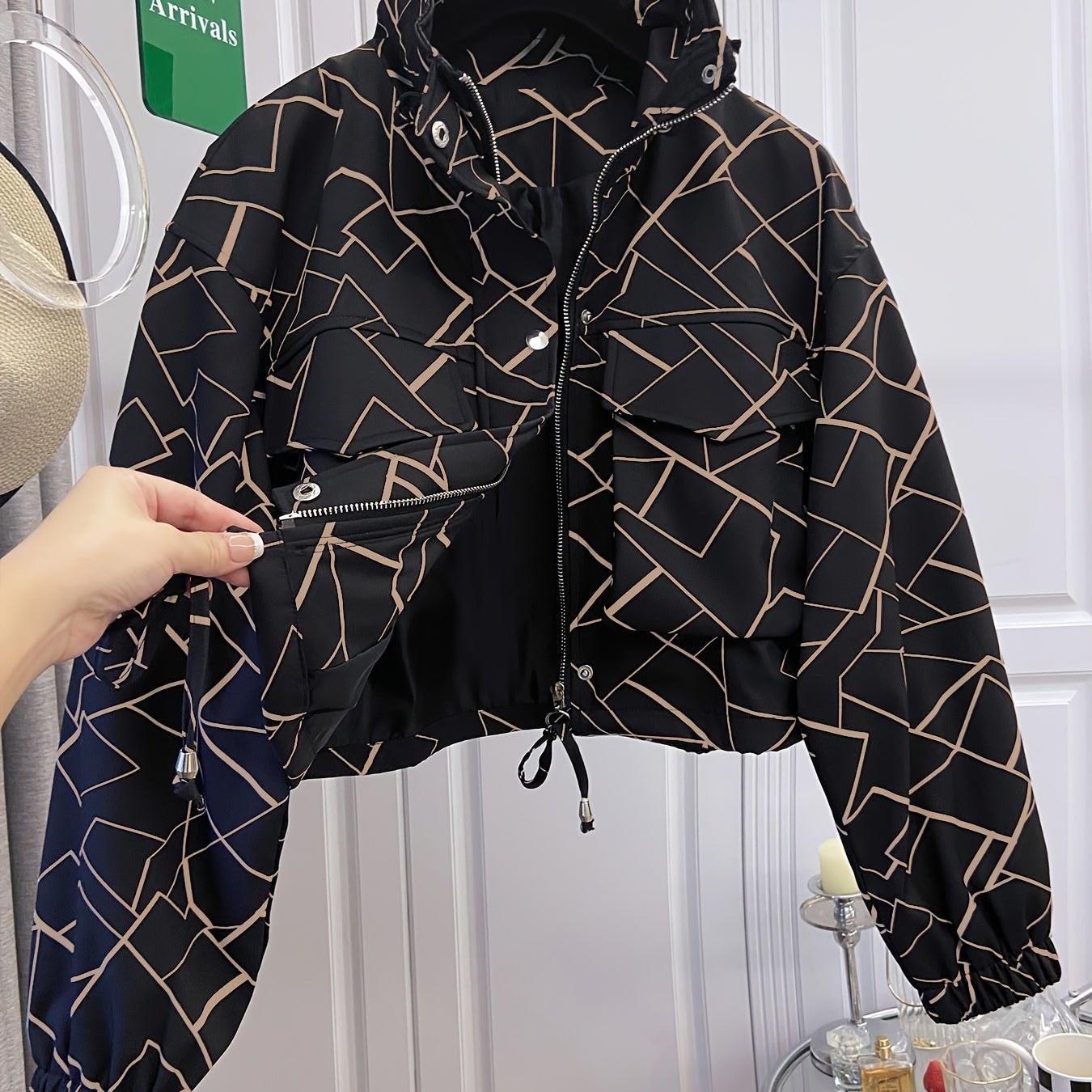 Women’s short jacket with stand-up collar and patterned print