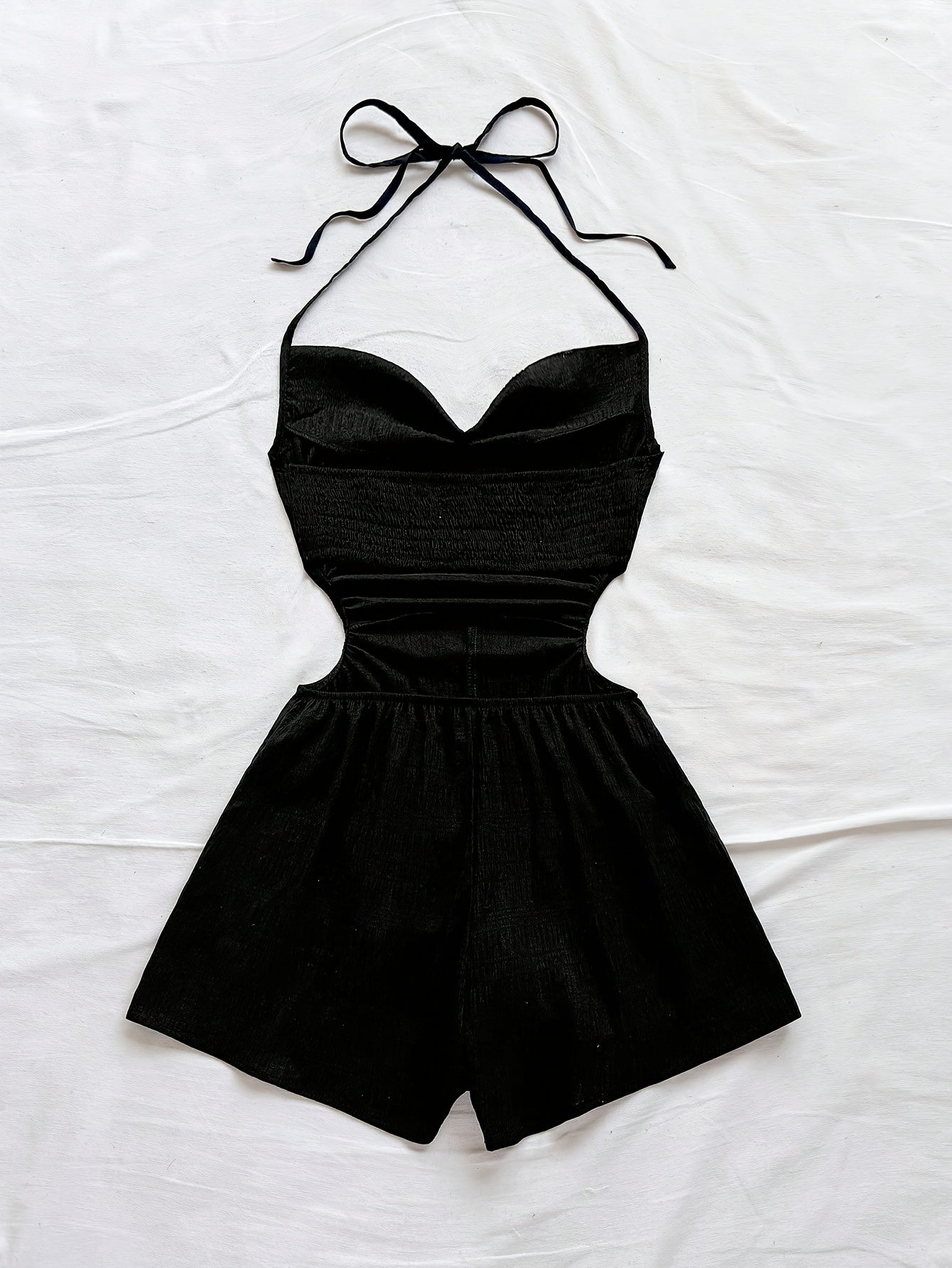 Women's jumpsuit with halter neck and cut-outs – fashionable one-piece for vacation and summer