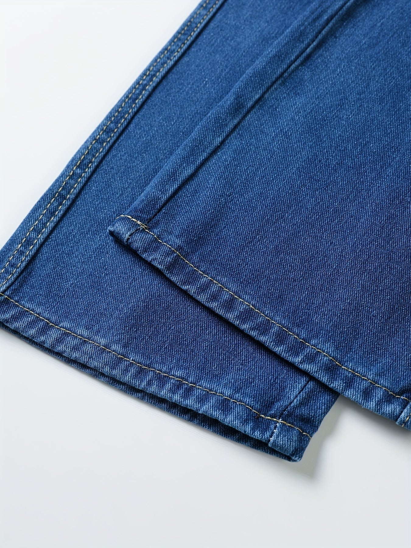 Dark blue jeans with an elastic waistband and drawstring