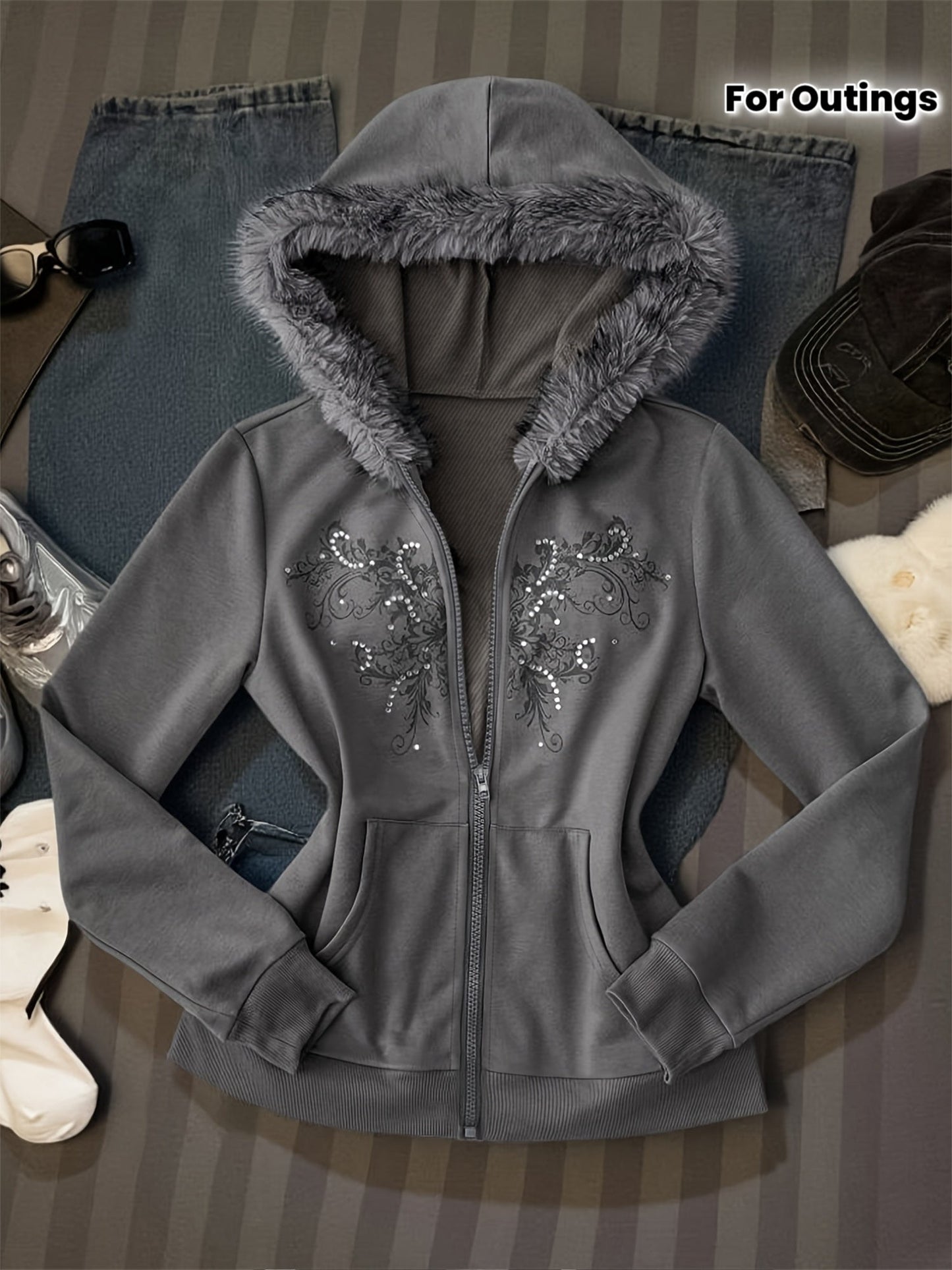 Women's hooded zip-up jacket with faux fur trim and a decorative pattern in gray