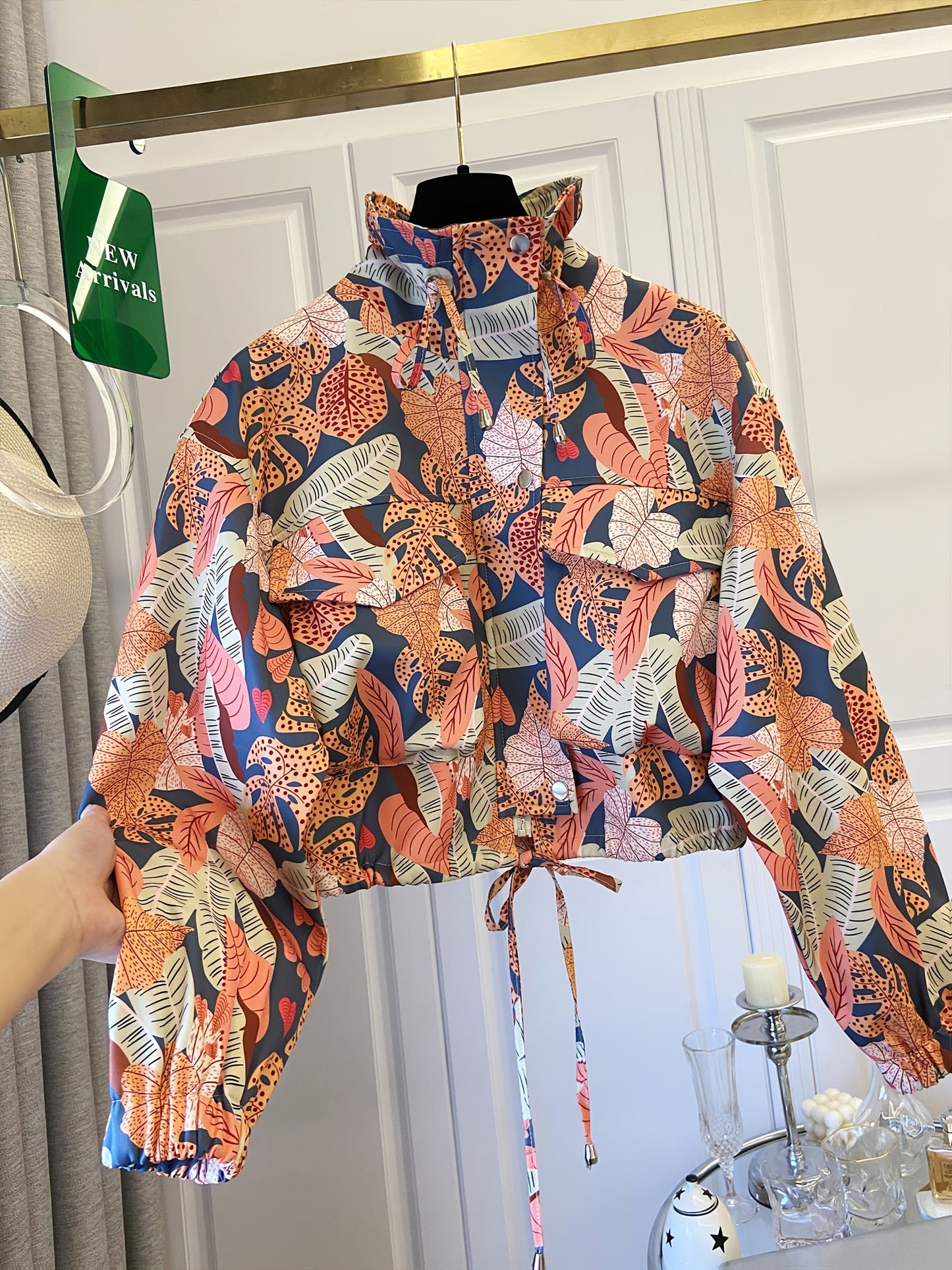 Women’s short jacket with stand-up collar and patterned print