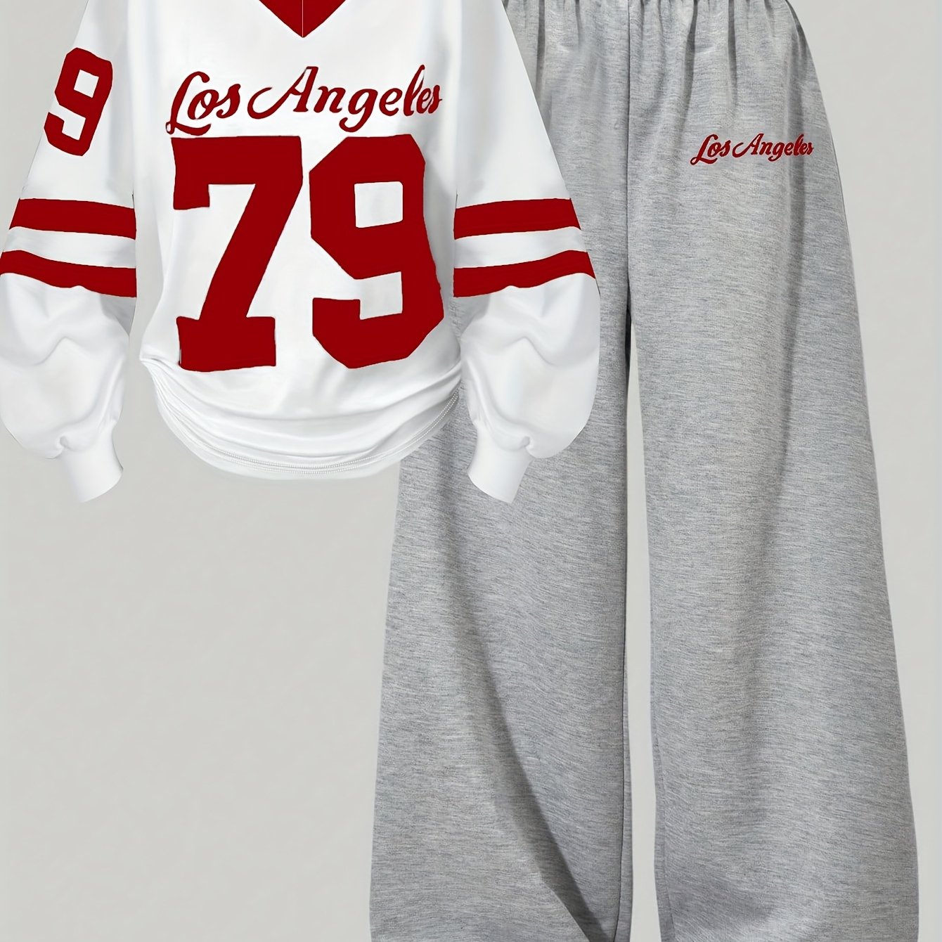 Two-piece women’s sports set: long-sleeve V-neck shirt and wide-leg pants, gray and white