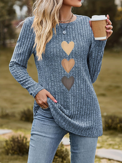 Women's black long-sleeve shirt with heart appliqués
