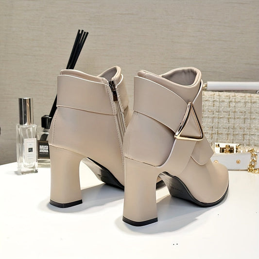 Women's ankle boots with a block heel, pointed toe, and side buckle