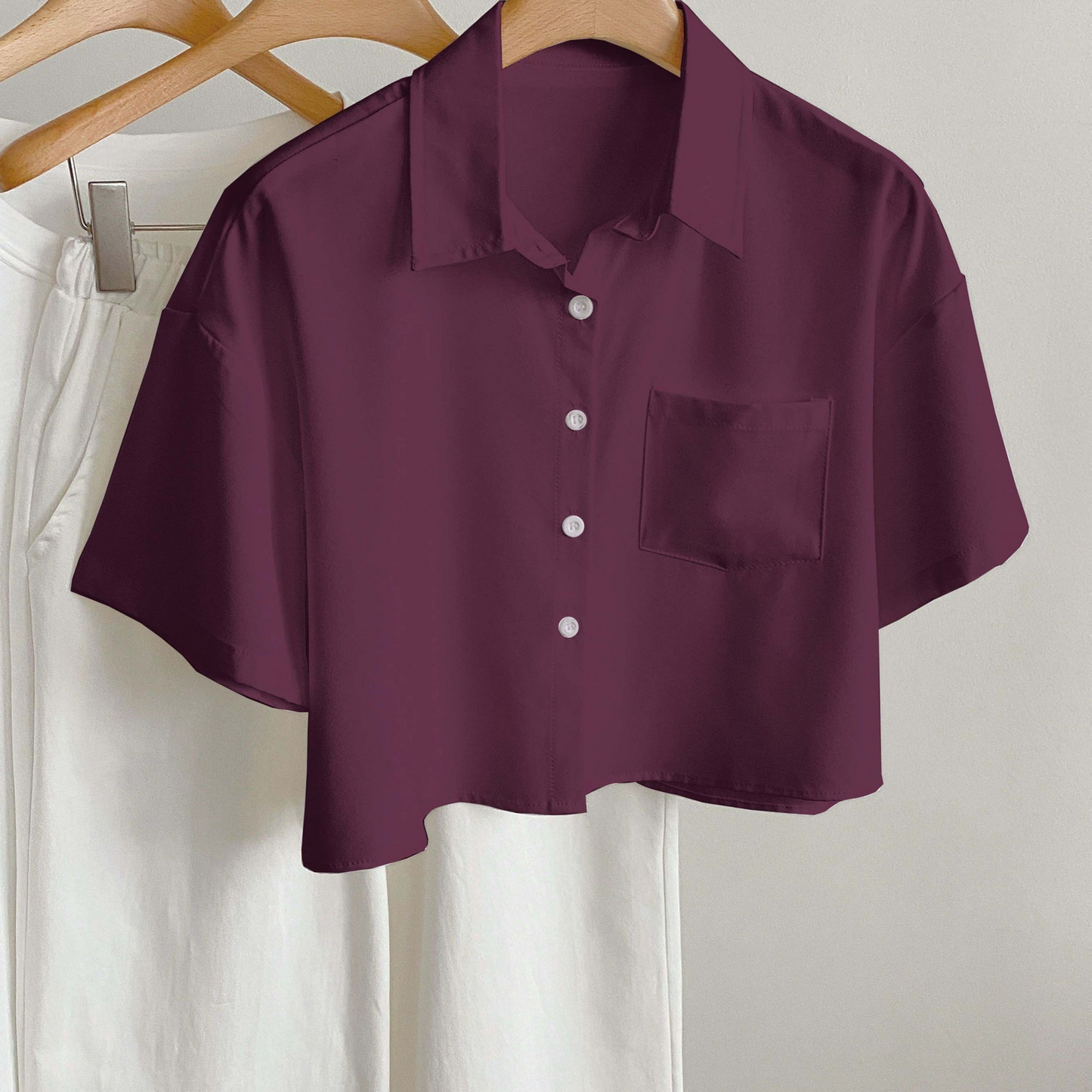 Women's short-sleeve blouse with crop cut and chest pocket – modern casual shirt
