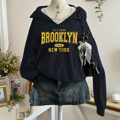 Sweatshirt with half-zip, collar, and Brooklyn print