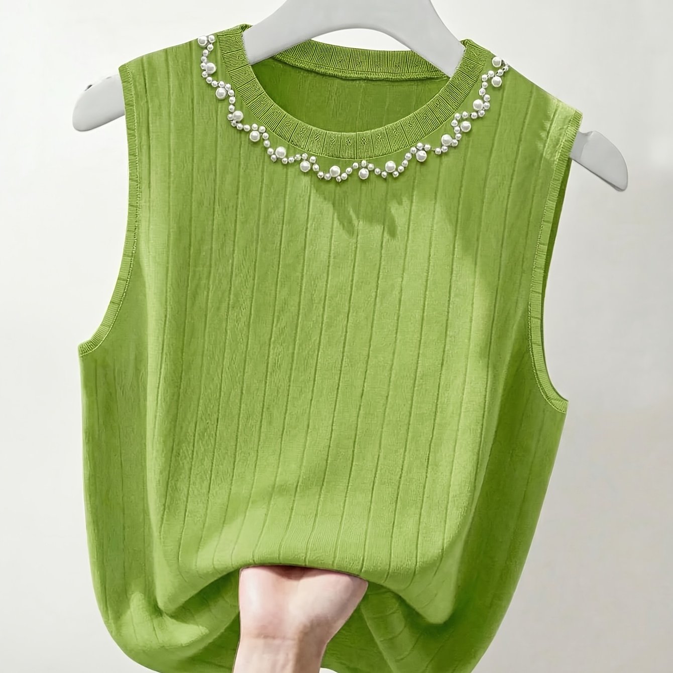 Women's sleeveless knit top with pearl embellishment – Elegant casual look for spring and summer