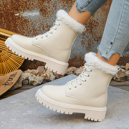 Women's worker boots with faux-fur lining, lacing, and lug soles
