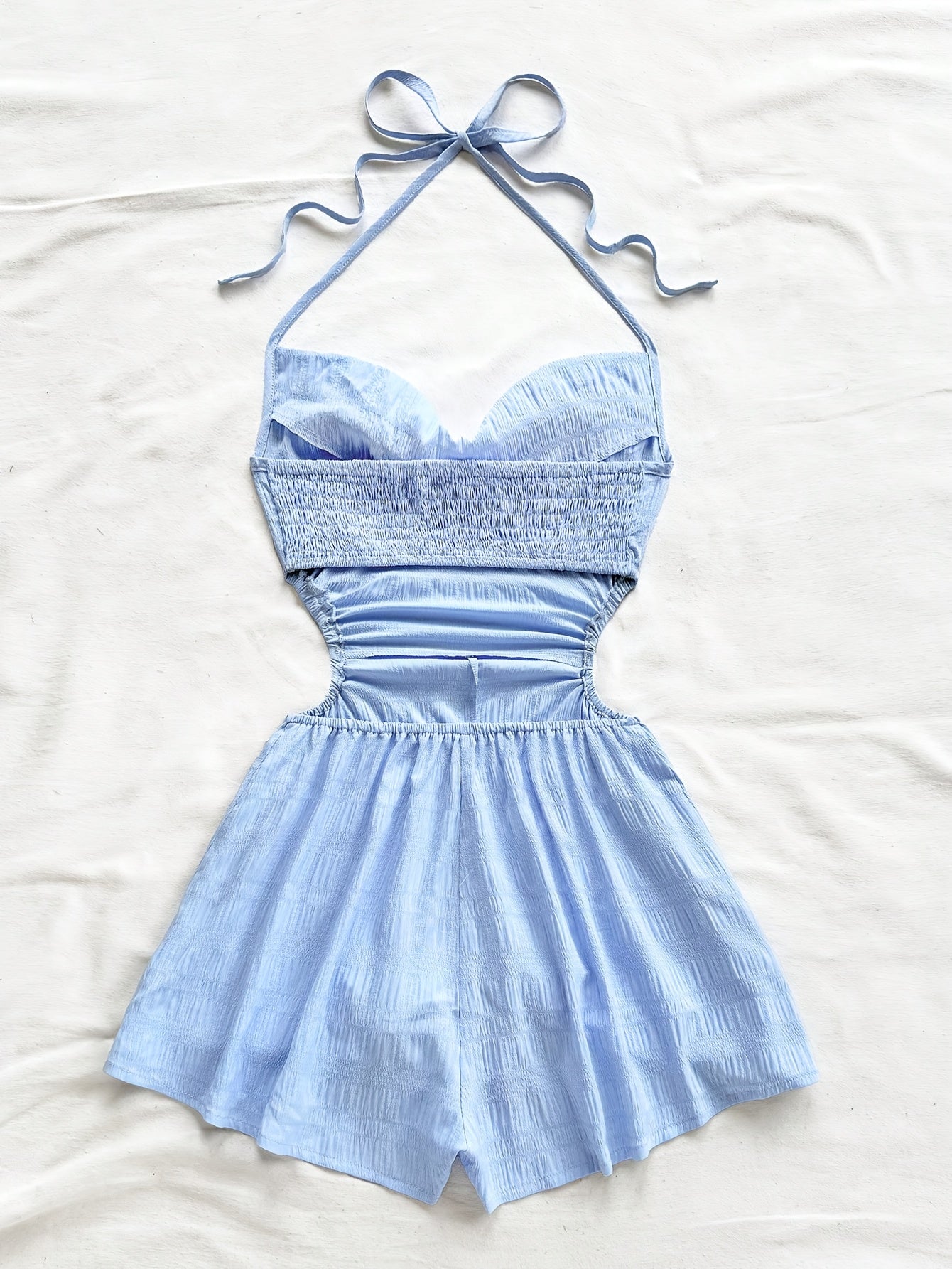 Women's jumpsuit with halter neck and cut-outs – fashionable one-piece for vacation and summer