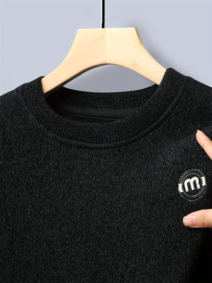 Unisex long-sleeve pullover with a crew neck and ribbed cuffs, lined
