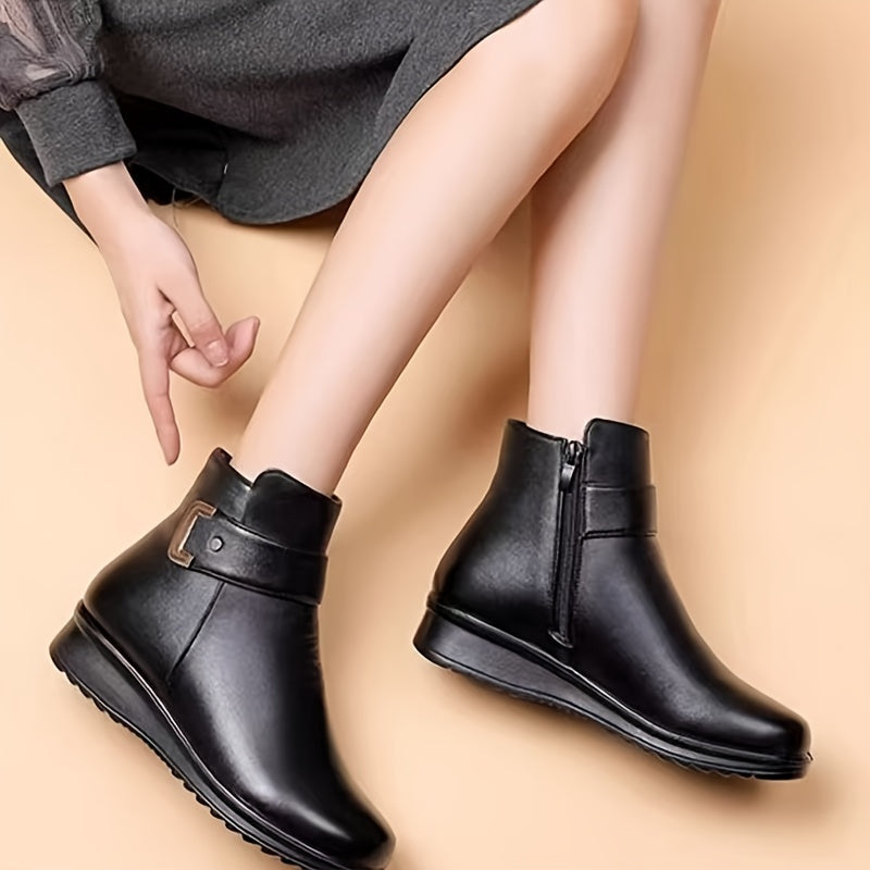Women’s black winter ankle boots with warm lining and buckle