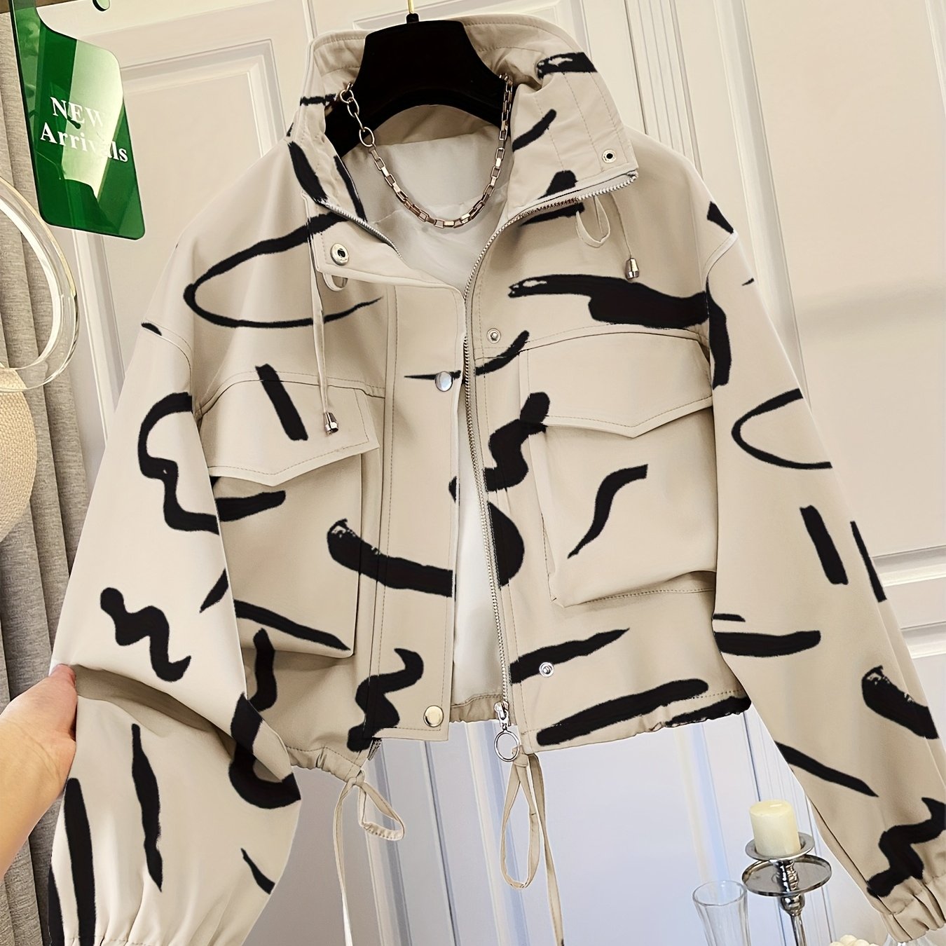 Women’s short jacket with stand-up collar and patterned print