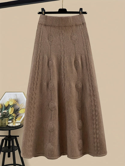 Women's knitted set with a turtleneck sweater and midi skirt