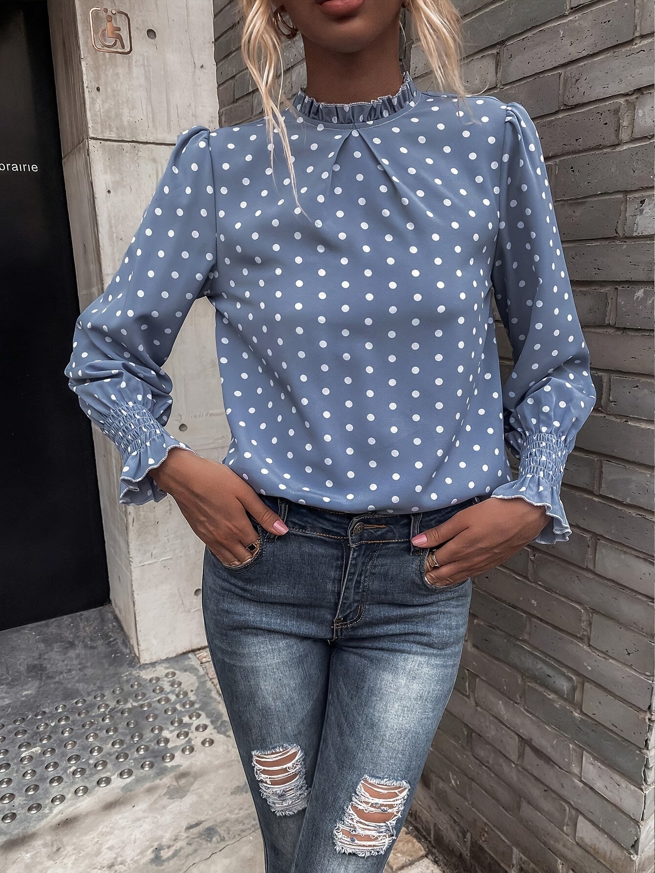 Women's blouse with polka-dot pattern, stand-up collar, and gathered sleeves