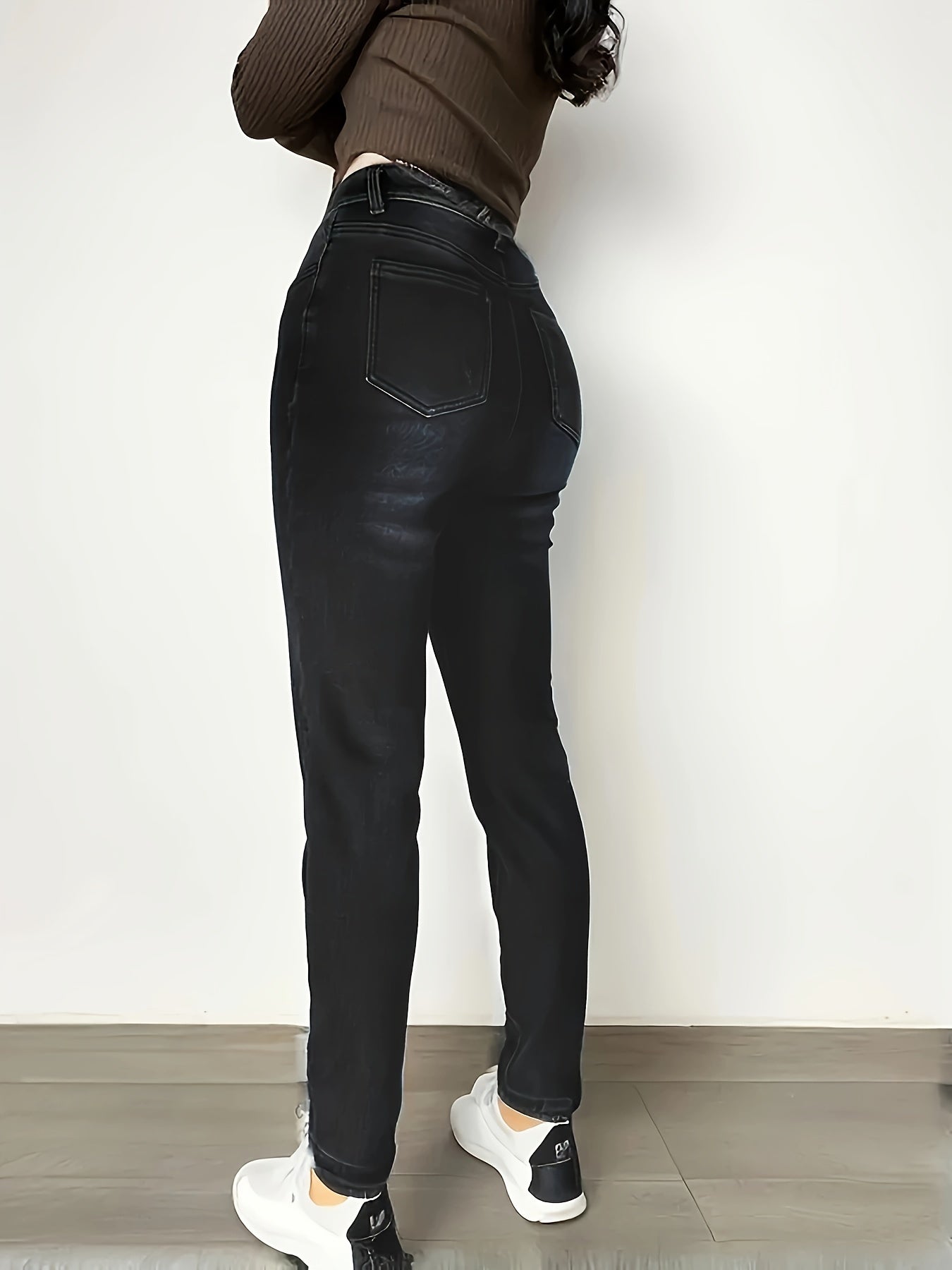 Black fleece-lined thermal jeans leggings with stretch for women