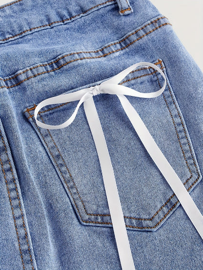 Women's denim mini skirt with pockets and bow detail – Elegant casual look