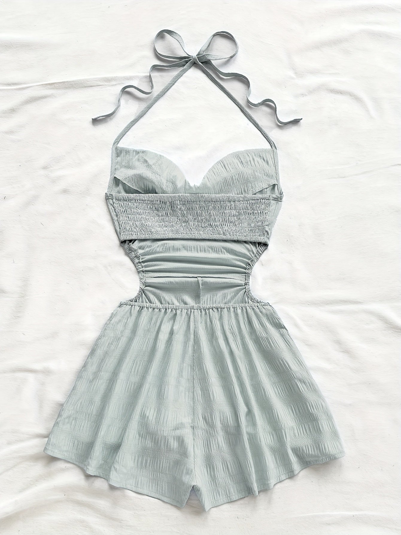 Women's jumpsuit with halter neck and cut-outs – fashionable one-piece for vacation and summer