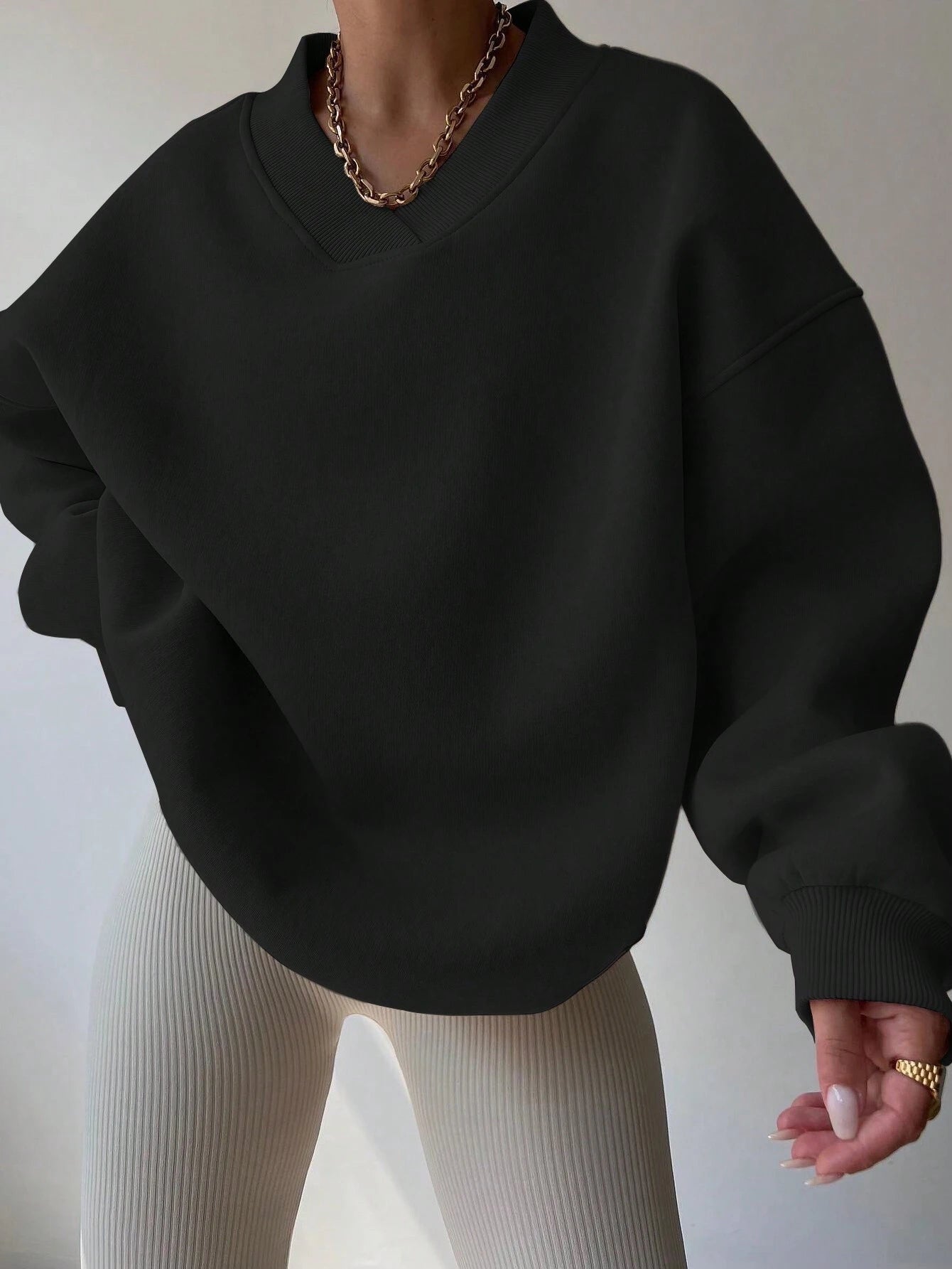 Black oversized V-neck sweatshirt for women