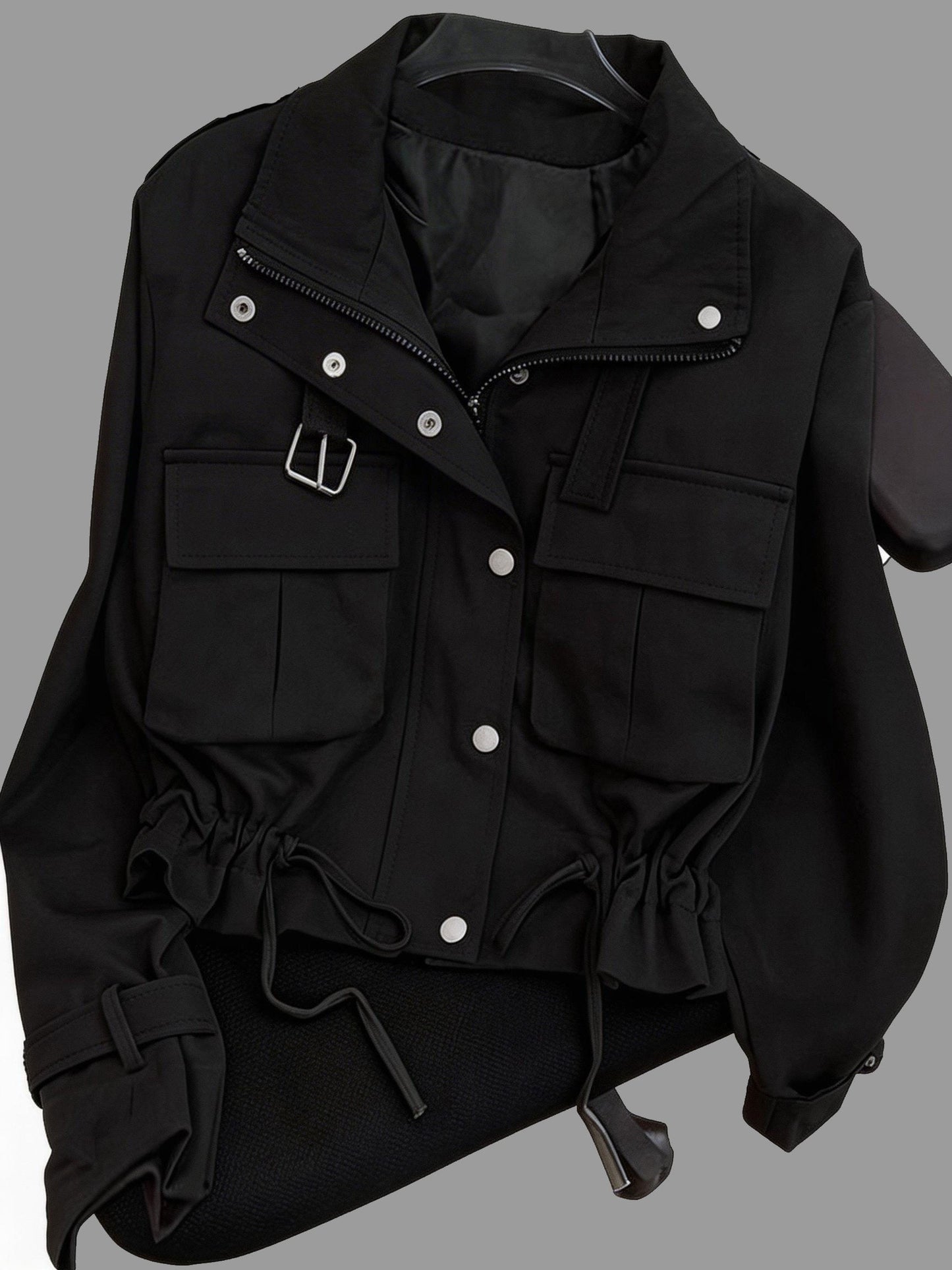 Short women's transitional jacket with zip, buttons & flap pockets