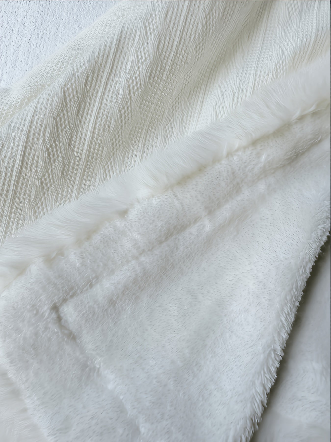 Women's white winter jacket with faux fur trim