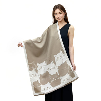 Women's poncho with cat pattern, fringe, and soft fabric