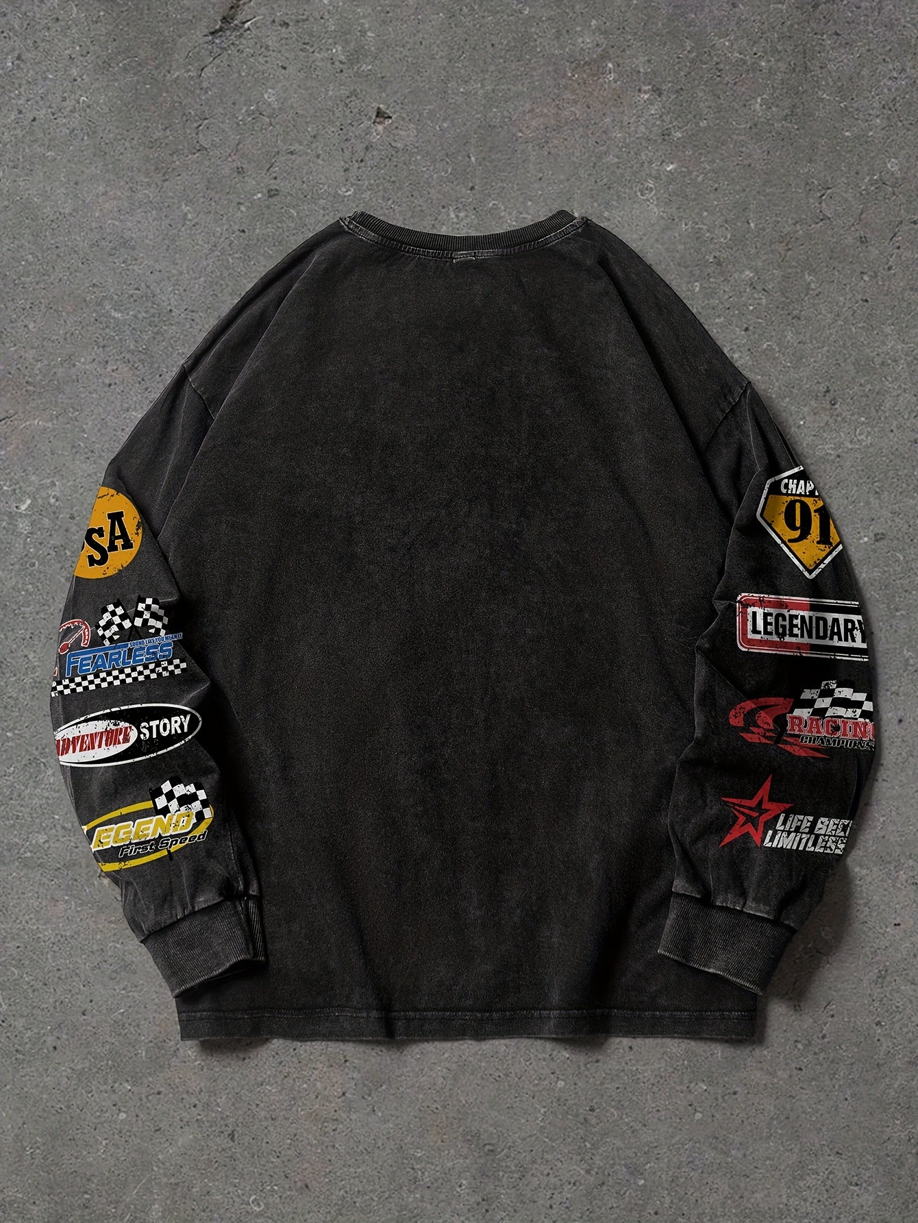 Unisex long-sleeve shirt, black cotton-look fabric, crew neck, “NO RISK NO STORY” print with sleeve patches