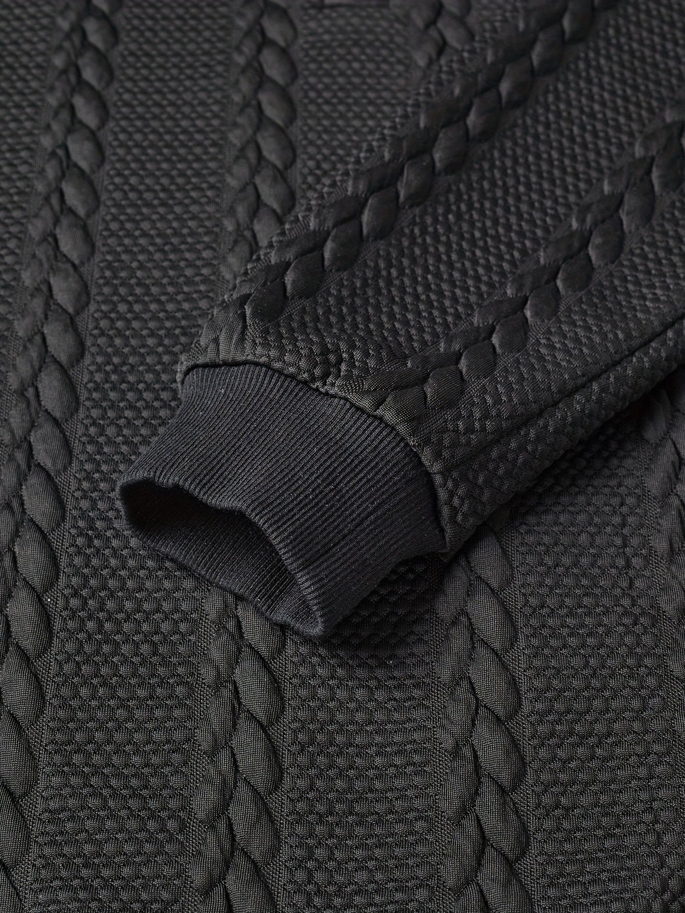 Men's textured black long-sleeve knit polo shirt