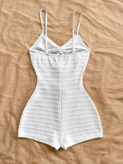 Women's beach jumpsuit with star appliqués and cut-outs – summery one-piece for vacation & pool parties