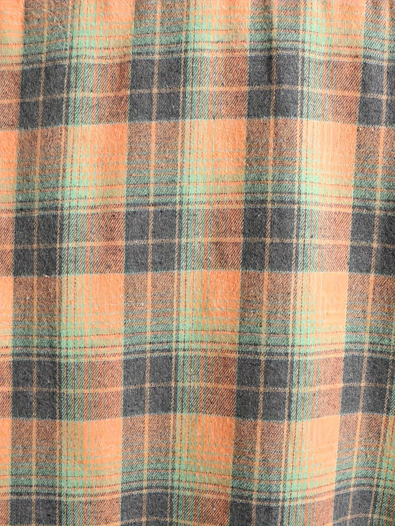 Men's orange and green plaid long-sleeve casual shirt with button placket
