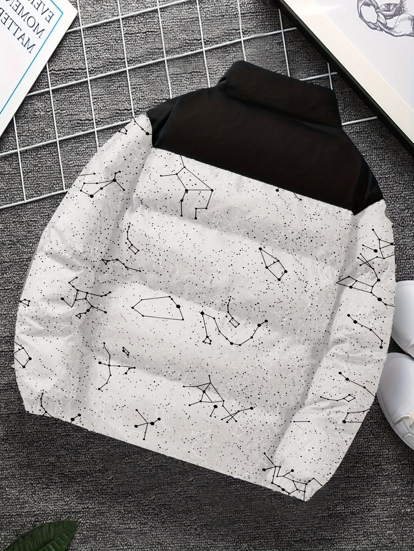 Padded jacket with constellation print, zipper, and stand-up collar