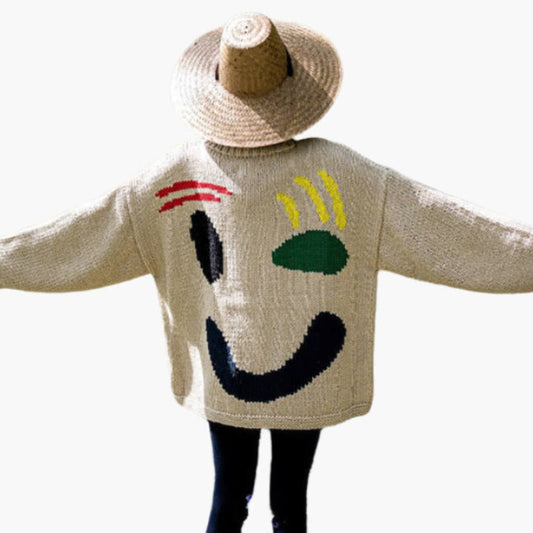 Damen Pullover mit verspieltem Gesichtsmotiv – Strickpullover im künstlerischen Stil für Freizeit & Alltag