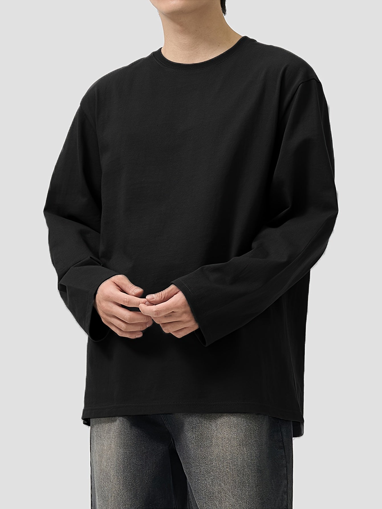 Unisex long-sleeve crew-neck basic shirt, black
