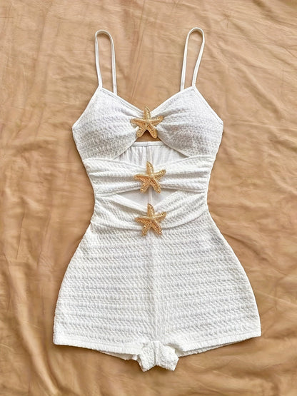 Women's beach jumpsuit with star appliqués and cut-outs – summery one-piece for vacation & pool parties