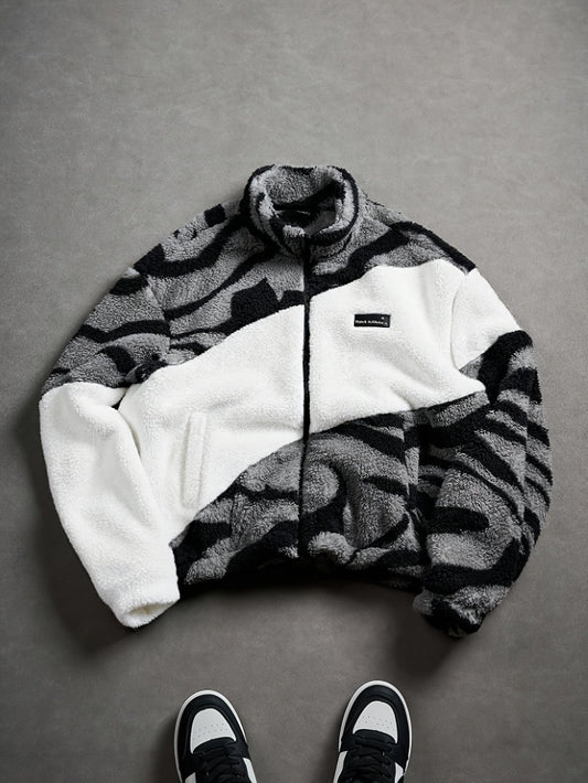 Unisex fleece jacket with stand-up collar, zipper, and animal print