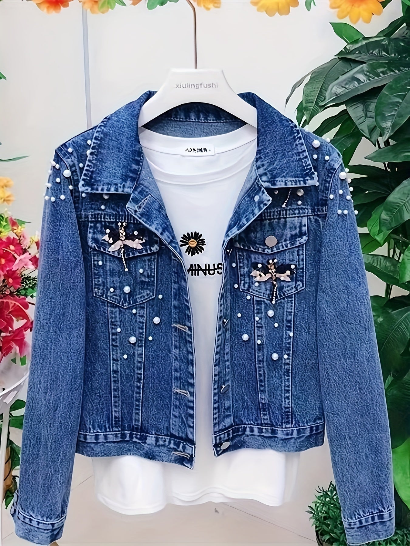 Women's denim jacket with blue pearl embellishments