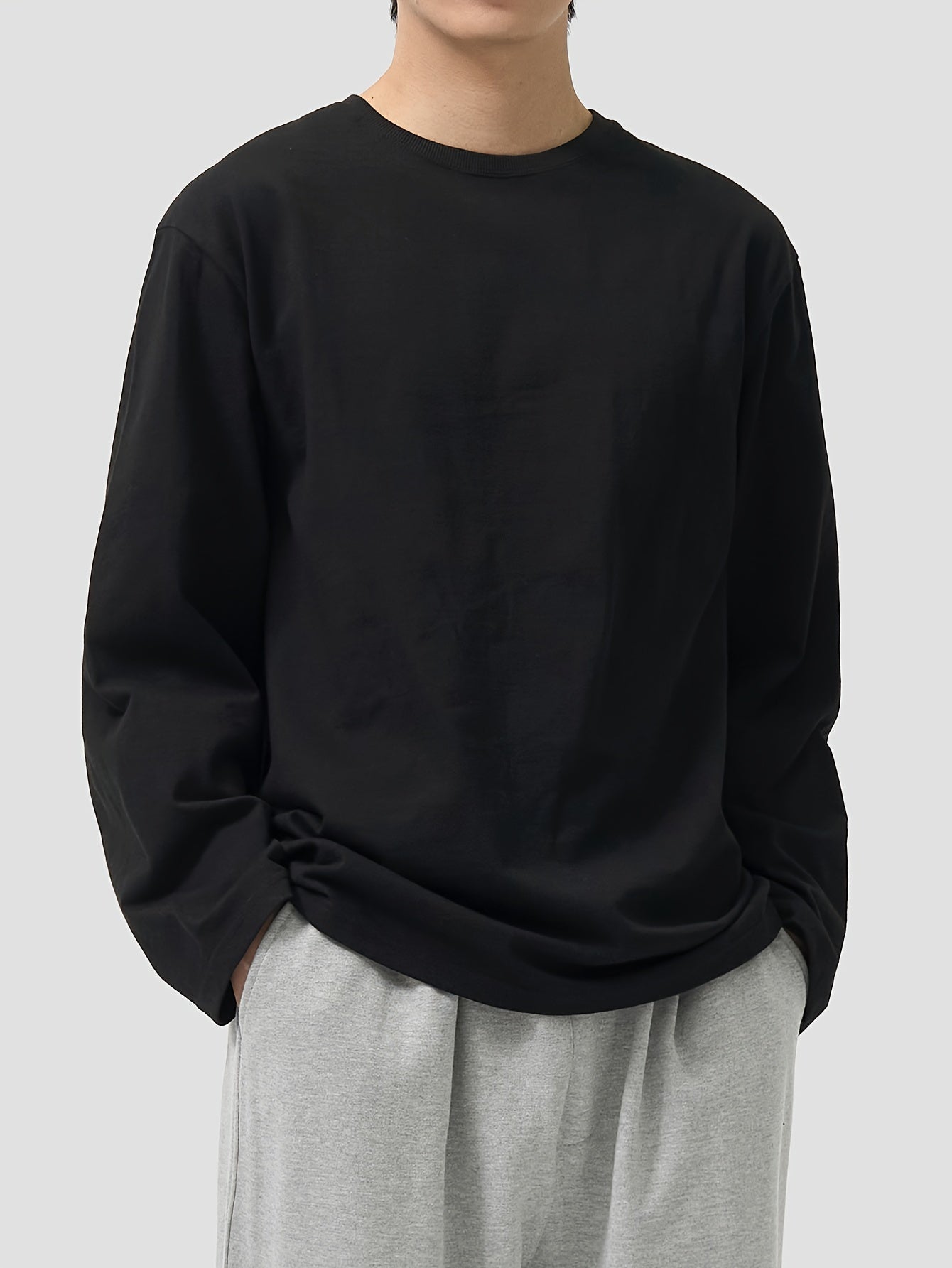 Unisex long-sleeve crew-neck basic shirt, black