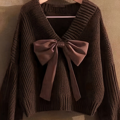 Women's ribbed long-sleeve V-neck sweater with a large bow